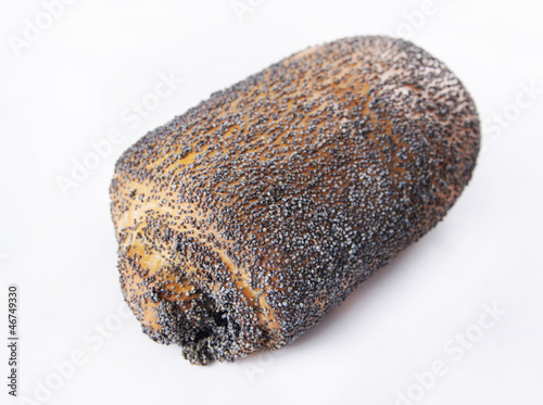 Photo: Bun dusted with poppy seed Bun dusted with poppy seed