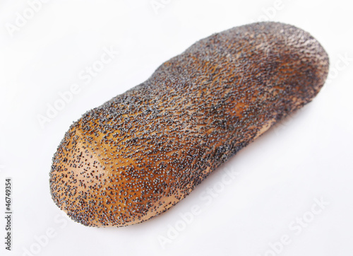 Photo: Bun dusted with poppy seed Bun dusted with poppy seed