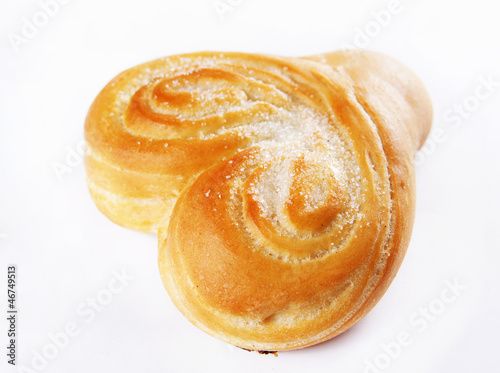 Photo: Freshly baked bun dusted with sugar Freshly baked bun dusted with sugar