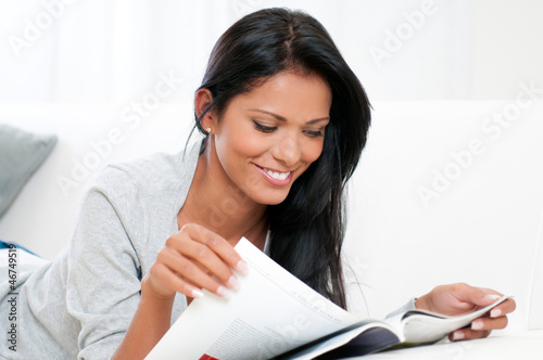 Photo: Relax at home with magazine Relax at home with magazine