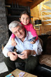 Little girl playing cards with grandpa