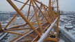 Winter construction. With the boom of a crane
