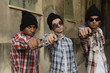 Gang members with guns on the street
