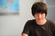 Foto: Boy sitting in a classroom Boy sitting in a classroom