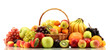 Assortment of exotic fruits in basket isolated on white