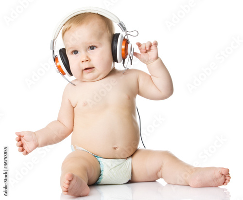 Photo: baby with headphone. young DJ baby with headphone. young DJ