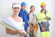 workers with one in the foreground