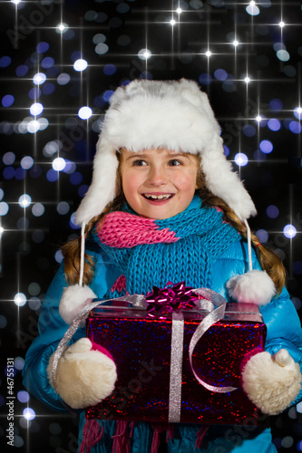 Photo: Christmas night, lovely girl is celebrating Christmas Christmas night, lovely girl is celebrating Christmas