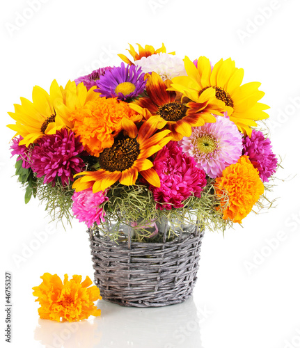 Photo: Beautiful bouquet of bright flowers isolated on white Beautiful bouquet of bright flowers isolated on white