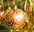 Photo: Christmas decoratice ball in gold Christmas decoratice ball in gold