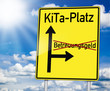 Wegweiser mit Kita-Platz und Betreuungsgeld