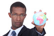 Businessman holding a globe