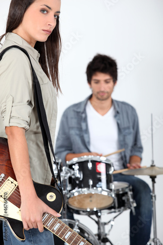 Photo: Couple playing music Couple playing music