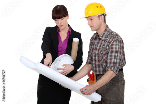 Photo: Tradesman consulting with an engineer Tradesman consulting with an engineer