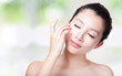 girl relax touch her eyes and face