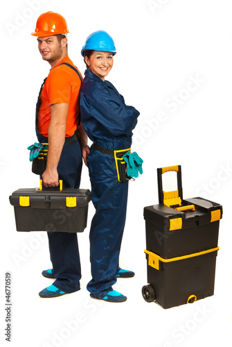 Photo: Cheerful builders workers Cheerful builders workers