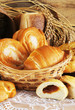 Still life with baked bread in a wicker basket