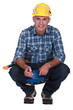 Man using electric sander