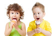 Photo: children or kids, little girl and boy eating ice cream isolated children or kids, little girl and boy eating ice cream isolated