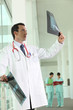Hospital doctor looking at an xray