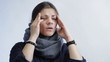 woman with headache isolated