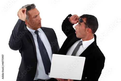 Photo: Businessmen recognizing one another Businessmen recognizing one another