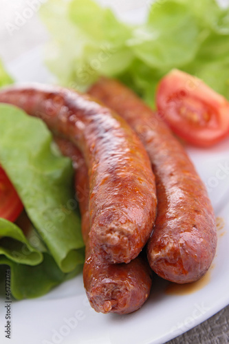 Photo: grilled sausage and salad grilled sausage and salad