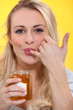 woman sucking her finger