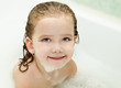 Little girl is taking a bath