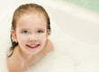 Little girl is taking a bath
