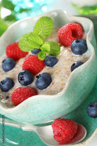 Photo: Oatmeal with fresh blueberries and raspberries. Oatmeal with fresh blueberries and raspberries.