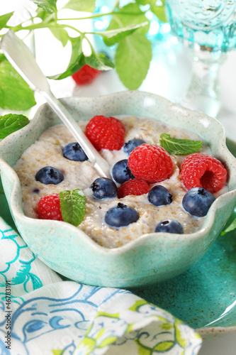 Photo: Oatmeal with fresh blueberries and raspberries. Oatmeal with fresh blueberries and raspberries.