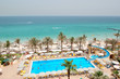 Swimming pool near beach at luxury hotel, Sharjah, UAE