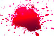 Red ink drops on a white background.