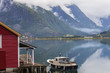 Wood house in norway on a lake