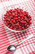 frozen red cranberry in bowl on napkin