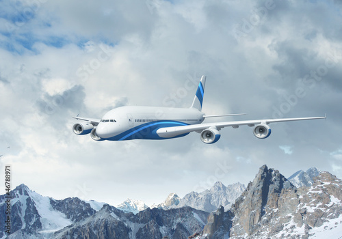 Photo: White passenger plane above the mountains White passenger plane above the mountains
