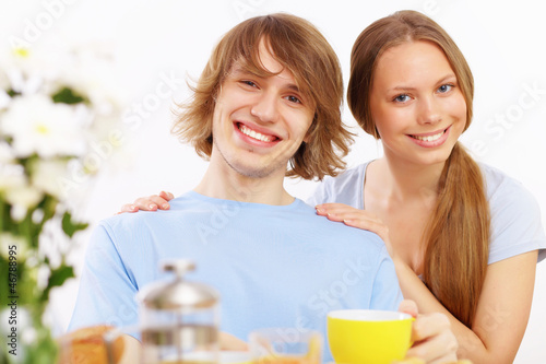 Photo: Couple at home drinking tea Couple at home drinking tea
