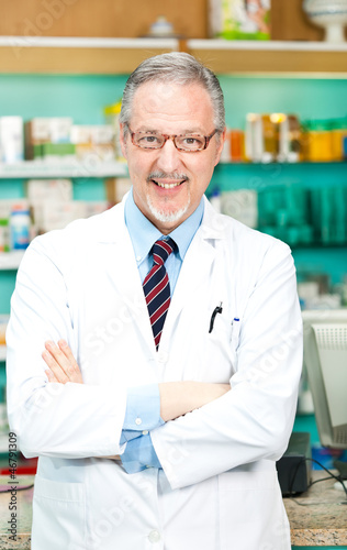 Photo: Portrait of a chemist in his store Portrait of a chemist in his store