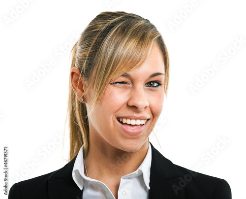 Photo: Beautiful executive woman winking at you Beautiful executive woman winking at you