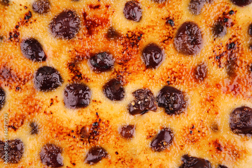 Photo: cream brulee with cherries closeup cream brulee with cherries closeup