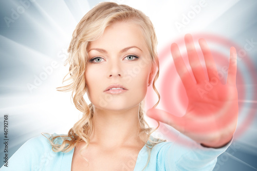Photo: woman making stop gesture woman making stop gesture