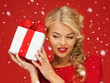 lovely woman in red dress with present