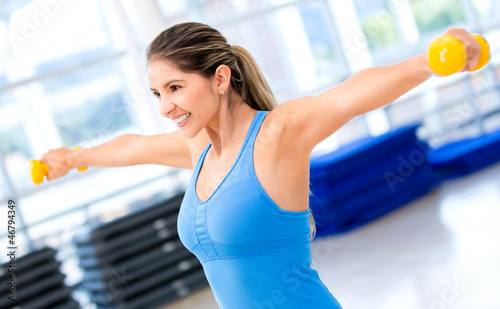 Photo: Gym woman working out Gym woman working out