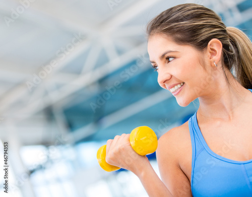 Photo: Gym woman exercising Gym woman exercising