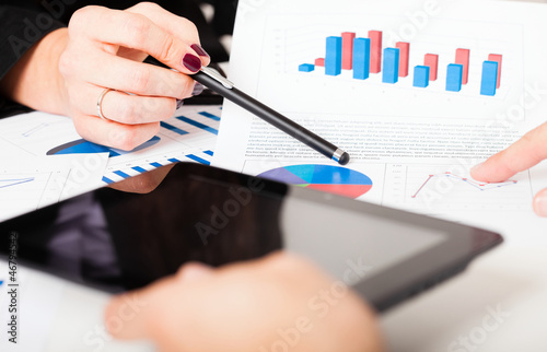 Photo: Business people discussing during a meeting Business people discussing during a meeting