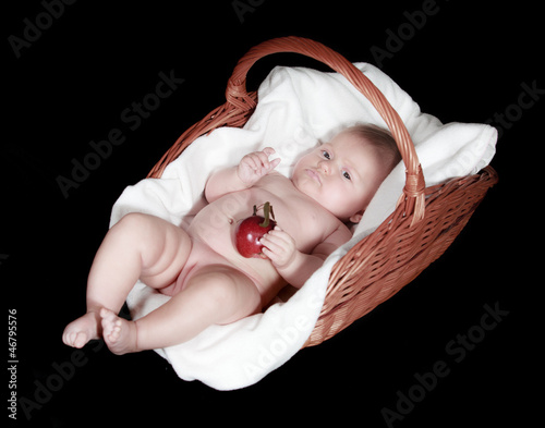 Photo: Portrait newborn baby in basket Portrait newborn baby in basket