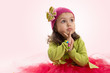 Girl in tutu and hat with butterfly