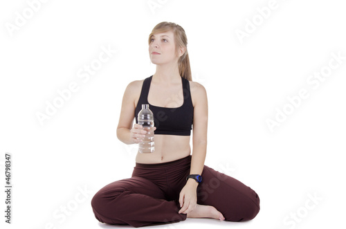 Photo: Sporty woman drinking water Sporty woman drinking water