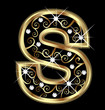 S gold letter with swirly ornaments